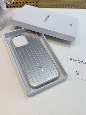 RIMOWA Metallic Silver Ribbed Phone Case iPhone 16 pro max